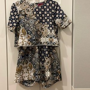 Paisley Boohoo romper in navy blue, brown, and white